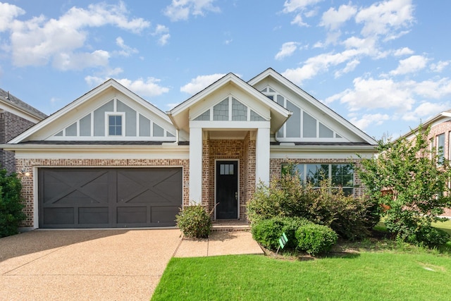 937 Nathanael Greene Ct, Aubrey, TX 76227 - craftsman house featuring concrete driveway, brick siding, an attached garage, and a front lawn