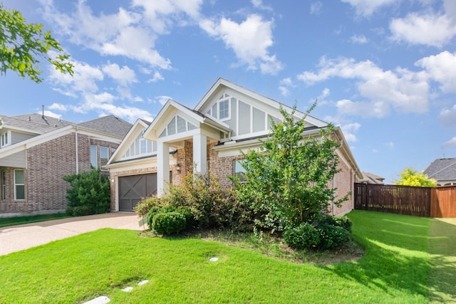 937 Nathanael Greene Ct, Aubrey, TX 76227 - view of front facade with brick siding, concrete driveway, and an attached garage