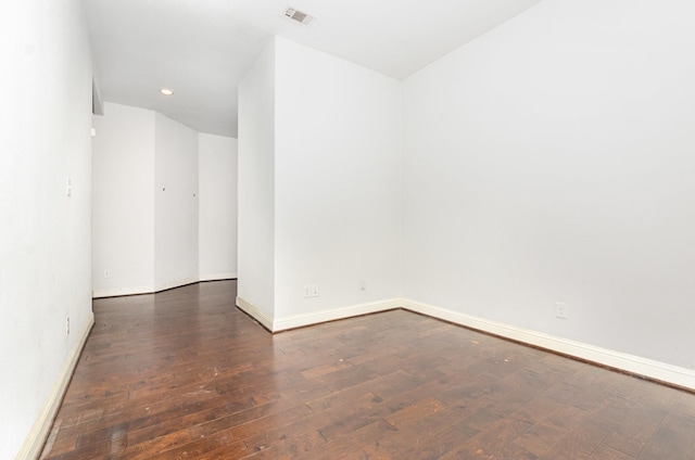 937 Nathanael Greene Ct, Aubrey, TX 76227 - unfurnished room with dark wood-style floors and recessed lighting