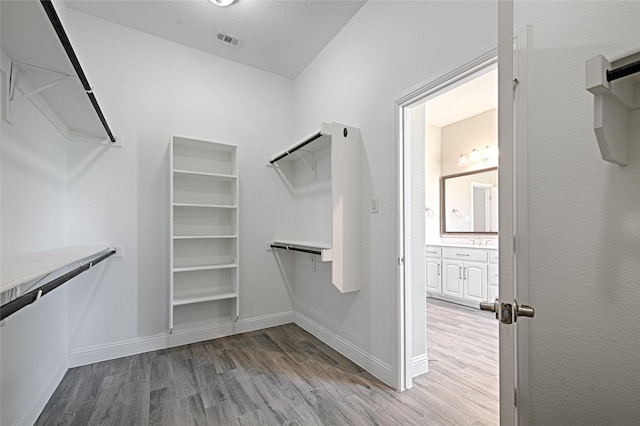 233 Cross Fox Ln, Aledo, TX 76008 - walk in closet featuring light wood-style floors