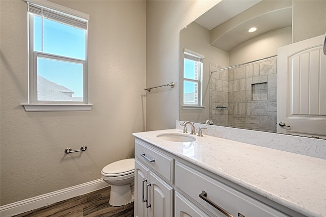 233 Cross Fox Ln, Aledo, TX 76008 - full bathroom with vanity, wood finished floors, and a tile shower
