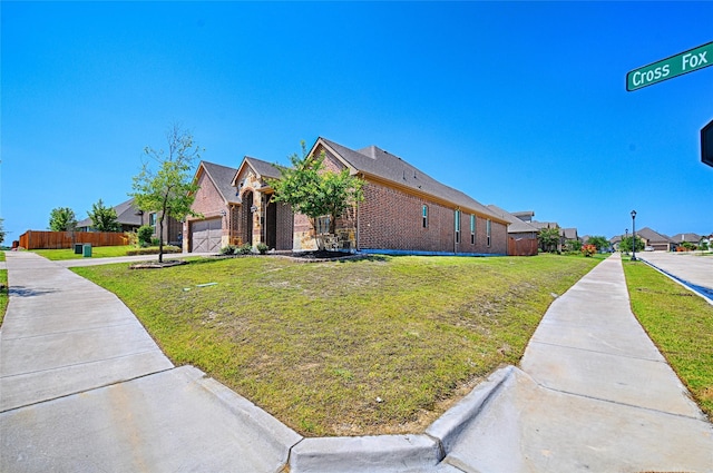 233 Cross Fox Ln, Aledo, TX 76008 - view of side of home featuring brick siding, a residential view, a yard, and a garage