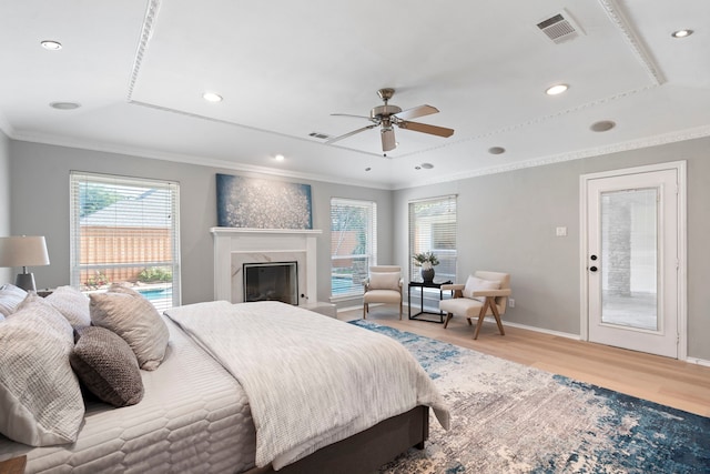 6104 Bluff Point Dr, Dallas, TX 75248 - bedroom with light wood-type flooring, crown molding, a premium fireplace, recessed lighting, and a ceiling fan