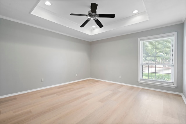6104 Bluff Point Dr, Dallas, TX 75248 - spare room featuring a tray ceiling, light wood finished floors, recessed lighting, ornamental molding, and a ceiling fan