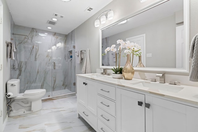 6104 Bluff Point Dr, Dallas, TX 75248 - bathroom with double vanity, a marble finish shower, marble finish flooring, and recessed lighting