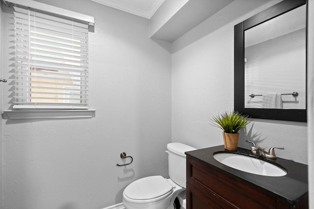 6104 Bluff Point Dr, Dallas, TX 75248 - half bathroom featuring ornamental molding and vanity