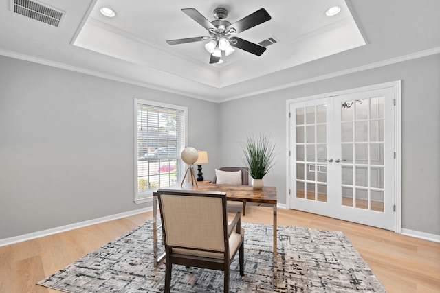 6104 Bluff Point Dr, Dallas, TX 75248 - office space featuring a tray ceiling, french doors, light wood finished floors, crown molding, and recessed lighting