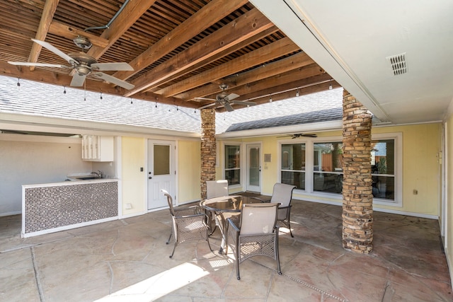 6104 Bluff Point Dr, Dallas, TX 75248 - view of patio with a ceiling fan, outdoor dining space, and an outdoor kitchen