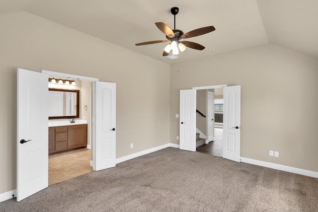 350 Windsor St, Waxahachie, TX 75165 - unfurnished bedroom featuring lofted ceiling, light carpet, ensuite bath, and ceiling fan