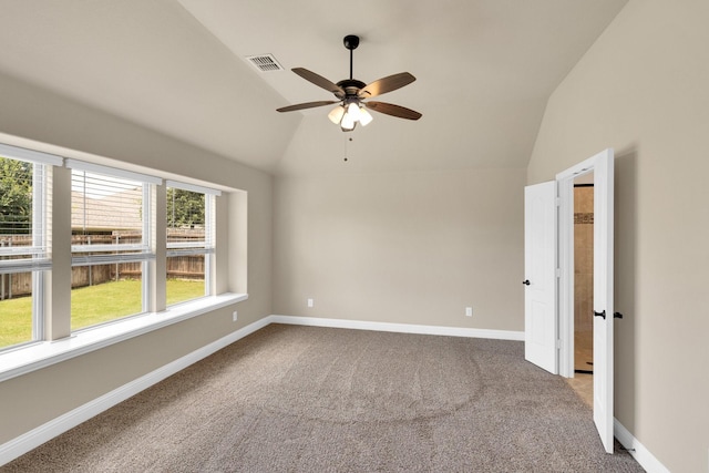 350 Windsor St, Waxahachie, TX 75165 - carpeted empty room with plenty of natural light, vaulted ceiling, and a ceiling fan