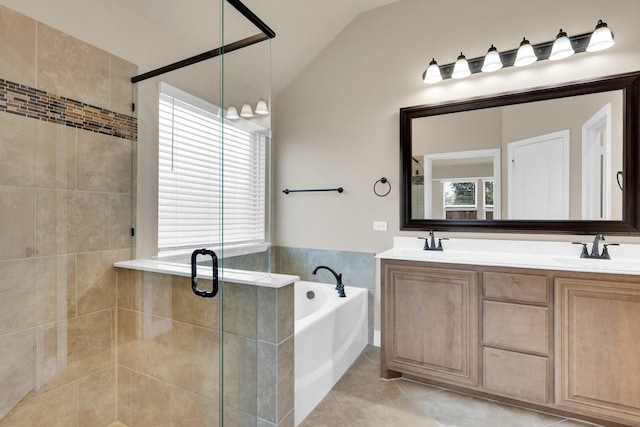 350 Windsor St, Waxahachie, TX 75165 - bathroom featuring a garden tub, a stall shower, healthy amount of natural light, and lofted ceiling