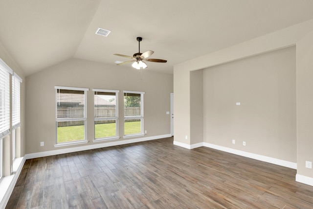 350 Windsor St, Waxahachie, TX 75165 - empty room featuring plenty of natural light, ceiling fan, dark wood-style flooring, and vaulted ceiling