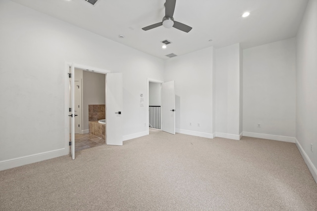 3200 Ross Ave Unit 22, Dallas, TX 75204 - unfurnished bedroom with light colored carpet, recessed lighting, ensuite bathroom, and ceiling fan