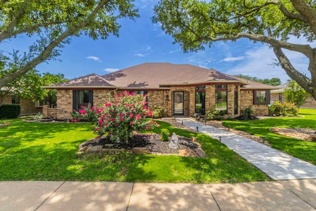 1614 Parkside Trl, Lewisville, TX 75077 - ranch-style home featuring a front lawn and brick siding