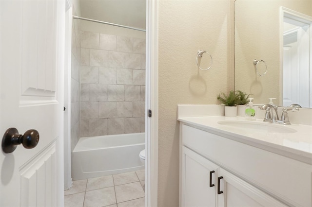 1117 Lake Woodland Dr, Little Elm, TX 75068 - bathroom featuring vanity, tile patterned floors, shower / washtub combination, and a textured wall