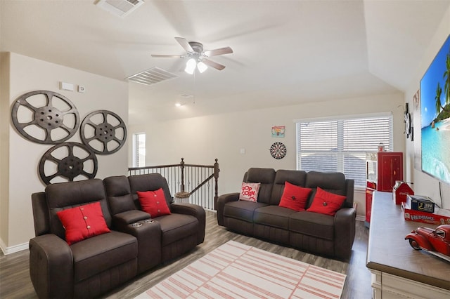 1117 Lake Woodland Dr, Little Elm, TX 75068 - living room with wood finished floors, ceiling fan, healthy amount of natural light, and vaulted ceiling