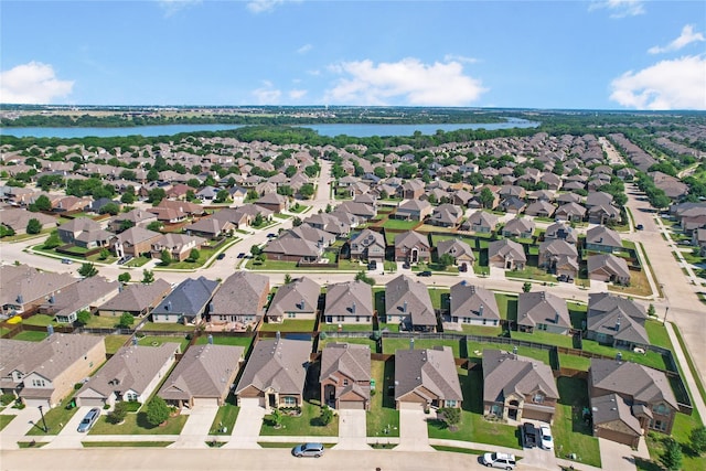 1117 Lake Woodland Dr, Little Elm, TX 75068 - aerial perspective of suburban area featuring a large body of water