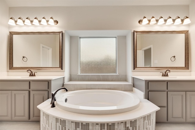629 Dean Box Dr, Waxahachie, TX 75165 - bathroom featuring two vanities and a bath