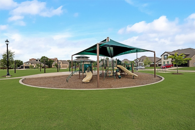 629 Dean Box Dr, Waxahachie, TX 75165 - communal playground featuring a lawn and a residential view