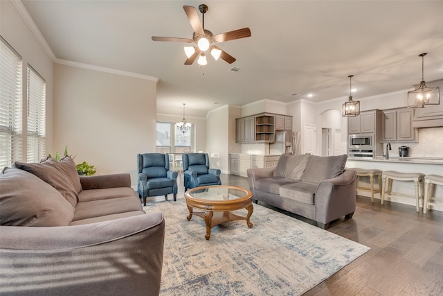 629 Dean Box Dr, Waxahachie, TX 75165 - living area with dark wood-style floors, ceiling fan, crown molding, a chandelier, and recessed lighting