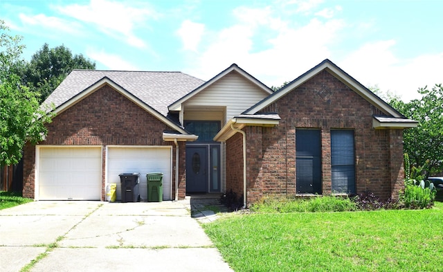 803 Ashmount Ln, Arlington, TX 76017 - view of front of home with concrete driveway, brick siding, a garage, a front yard, and roof with shingles