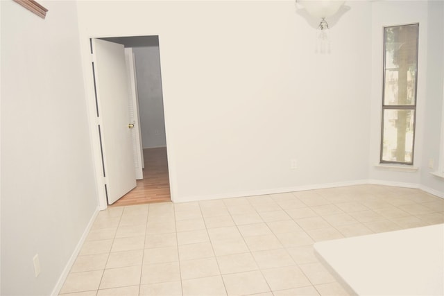 803 Ashmount Ln, Arlington, TX 76017 - spare room featuring light tile patterned floors