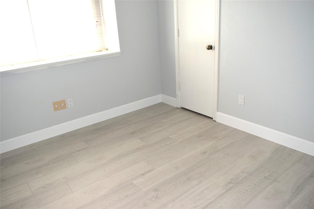 803 Ashmount Ln, Arlington, TX 76017 - empty room with light wood finished floors