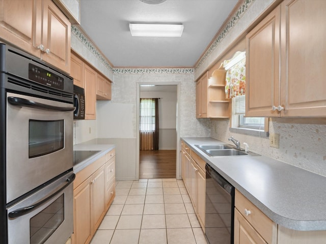1704 Charlottesville Dr, Ennis, TX 75119 - kitchen with black appliances, light brown cabinets, light tile patterned flooring, light countertops, and open shelves