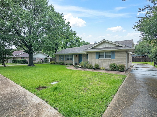1704 Charlottesville Dr, Ennis, TX 75119 - ranch-style house with brick siding, concrete driveway, and roof with shingles