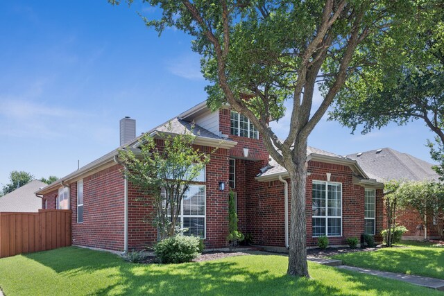 1467 Bent Tree, Frisco, TX 75036 - view of front facade with brick siding and a chimney