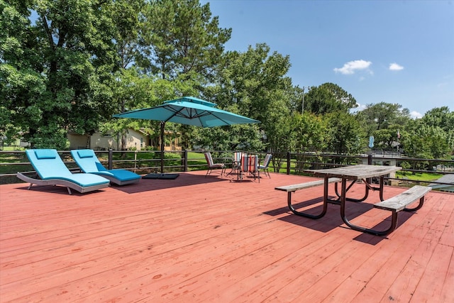 152 Guadalupe Dr, Gun Barrel City, TX 75156 - wooden terrace featuring outdoor dining space and view of scattered trees