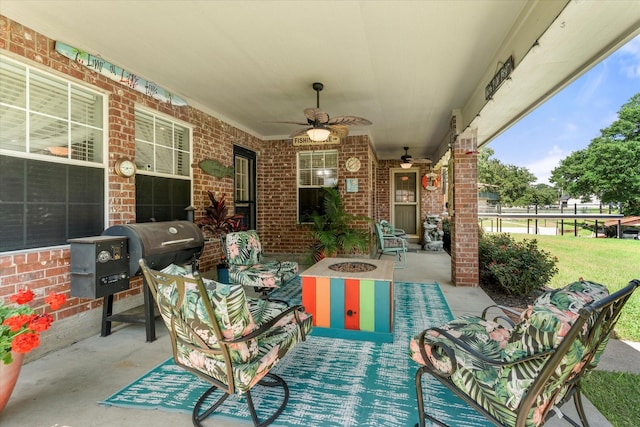 152 Guadalupe Dr, Gun Barrel City, TX 75156 - view of patio / terrace with a fire pit and ceiling fan