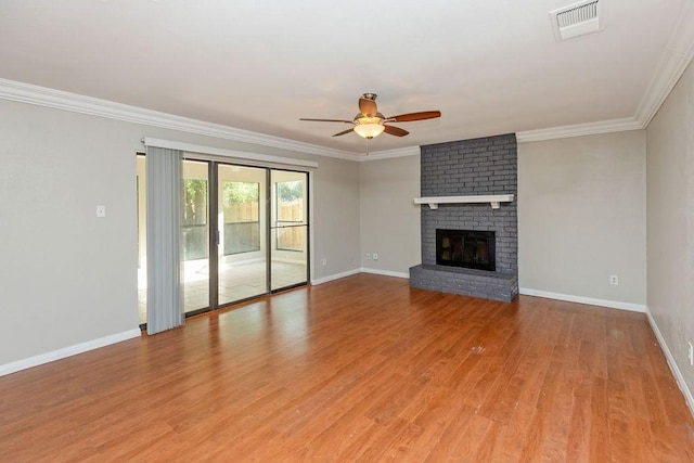 1804 Briarpath Ln, Arlington, TX 76018 - unfurnished living room with ceiling fan, crown molding, light wood-style floors, and a fireplace