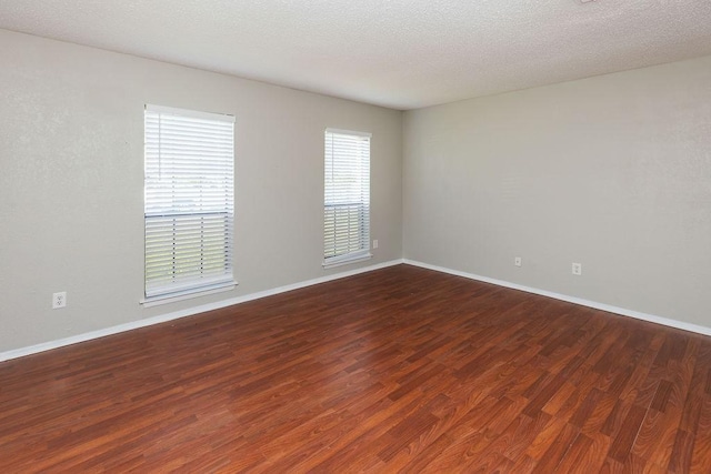 1804 Briarpath Ln, Arlington, TX 76018 - spare room with wood finished floors and a textured ceiling