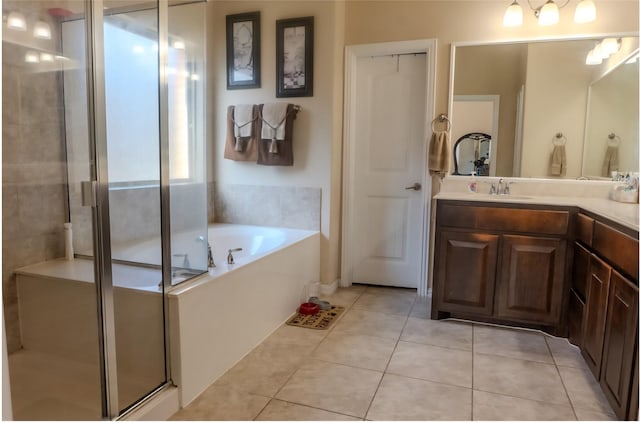 3812 Gennaker Dr, Denton, TX 76210 - bathroom with vanity, a garden tub, a shower stall, and tile patterned floors