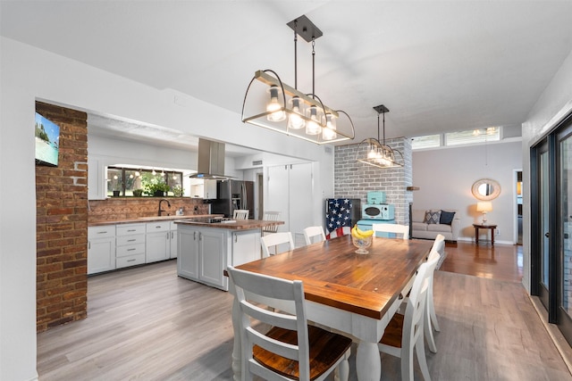 4925 Terrace Trl, Fort Worth, TX 76114 - dining room featuring light wood-style floors and plenty of natural light