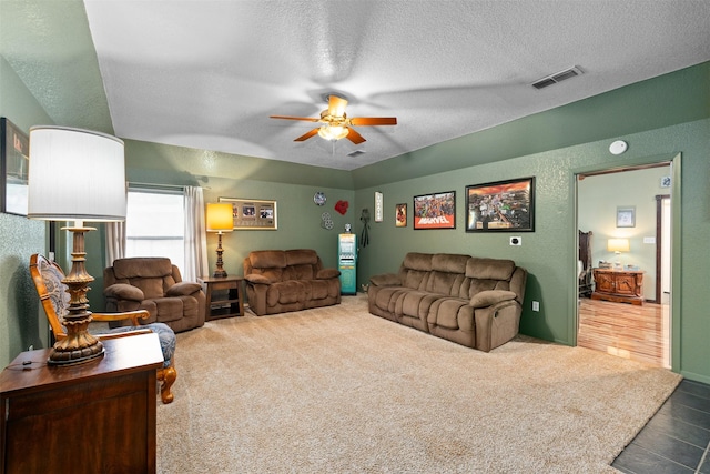 4925 Terrace Trl, Fort Worth, TX 76114 - living area featuring a ceiling fan, a textured ceiling, and carpet