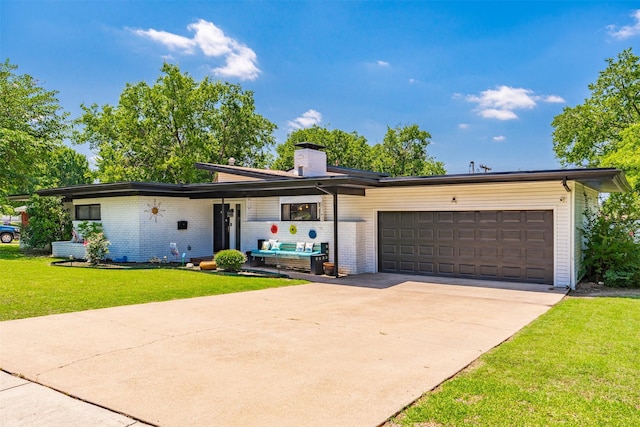 4925 Terrace Trl, Fort Worth, TX 76114 - view of front of property featuring a garage, a front yard, driveway, a chimney, and brick siding