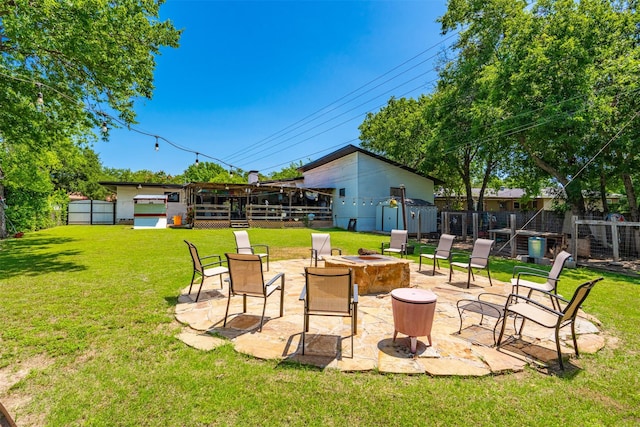 4925 Terrace Trl, Fort Worth, TX 76114 - fenced backyard with an outdoor fire pit and a patio