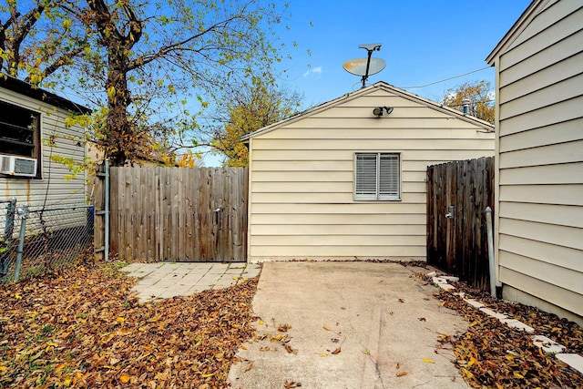 1725 Engle Ave, Dallas, TX 75224 - view of side of home featuring a patio area and cooling unit