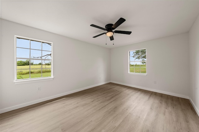 1012 W Trinity St, Groesbeck, TX 76642 - spare room with light wood-style floors and a ceiling fan