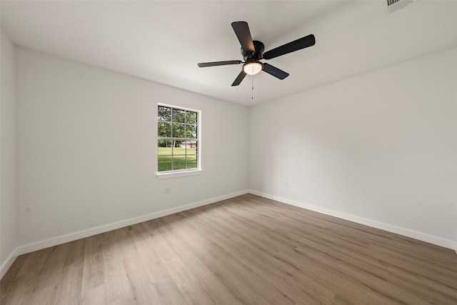 1012 W Trinity St, Groesbeck, TX 76642 - unfurnished room featuring wood finished floors and ceiling fan