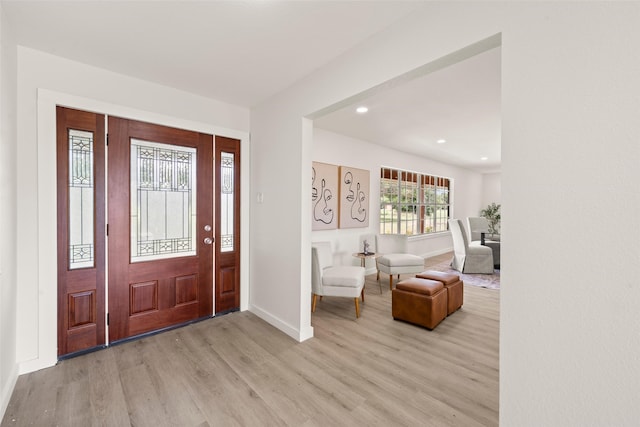 1012 W Trinity St, Groesbeck, TX 76642 - foyer entrance with light wood finished floors and recessed lighting