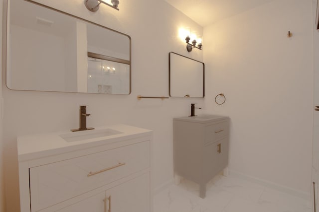 3127 Mcdermott Ave, Dallas, TX 75215 - bathroom with marble finish floors and two vanities