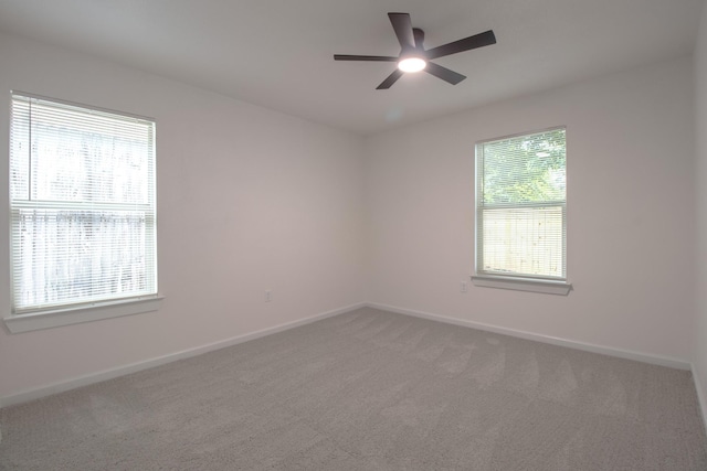 3127 Mcdermott Ave, Dallas, TX 75215 - carpeted spare room with ceiling fan and baseboards