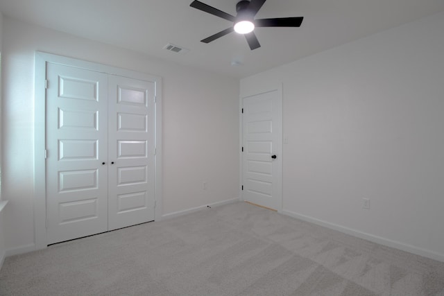 3127 Mcdermott Ave, Dallas, TX 75215 - unfurnished bedroom with carpet floors, a closet, and ceiling fan