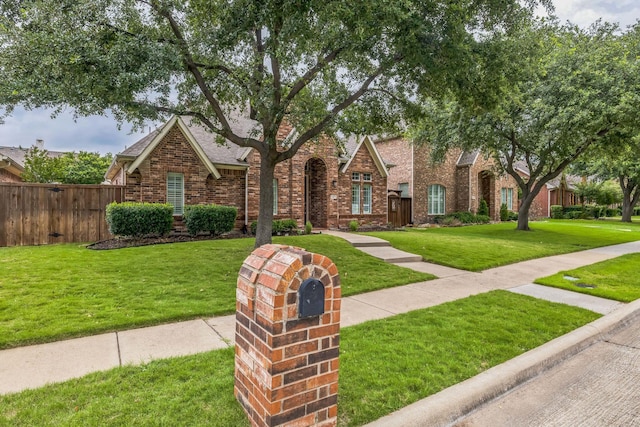 4471 Chandler Dr, Frisco, TX 75034 - view of front of home featuring brick siding and a shingled roof