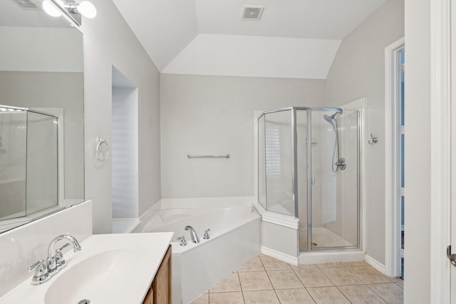 4471 Chandler Dr, Frisco, TX 75034 - full bathroom featuring a garden tub, vanity, a shower stall, tile patterned flooring, and lofted ceiling