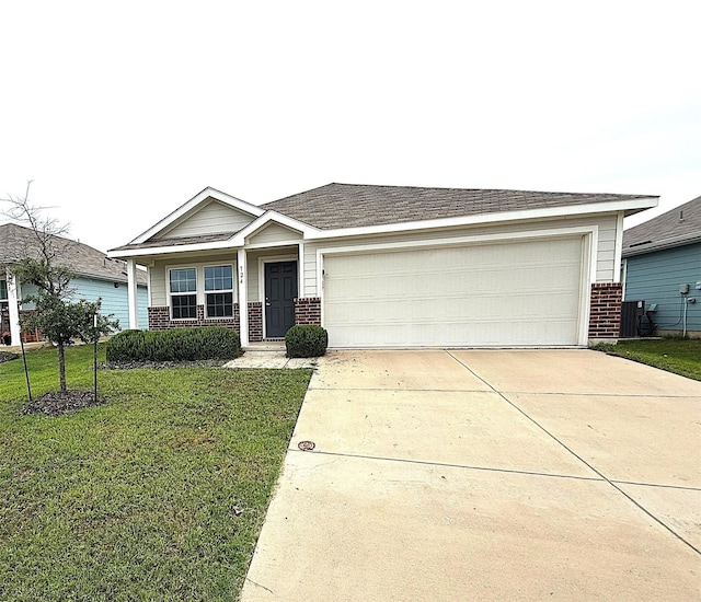 724 Autumnwood Way, Princeton, TX 75407 - ranch-style home featuring brick siding, a garage, a front lawn, and concrete driveway