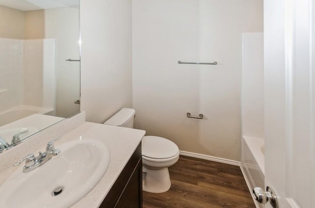 724 Autumnwood Way, Princeton, TX 75407 - full bathroom featuring wood finished floors, vanity, and bathing tub / shower combination